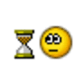 Sad smiley face with hourglass